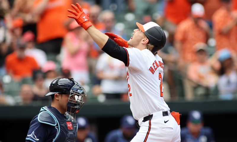 Jun 2, 2024; Baltimore, Maryland, USA; Baltimore Orioles shortstop Gunnar Henderson (2) celebrates after scoring a run during the first inning against the Tampa Bay Rays at Oriole Park at Camden Yards. Mandatory Credit: Daniel Kucin Jr.-USA TODAY Sports