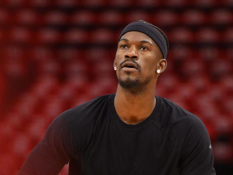HOUSTON, TX - APRIL 30: Jimmy Butler #10 of the Golden State Warriors warms up before the game against the Houston Rockets during game five on April 30, 2025 at the Toyota Center in Houston, Texas. NOTE TO USER: User expressly acknowledges and agrees that, by downloading and or using this photograph, User is consenting to the terms and conditions of the Getty Images License Agreement. Mandatory Copyright Notice: Copyright 2025 NBAE (Photo by David Dow/NBAE via Getty Images)