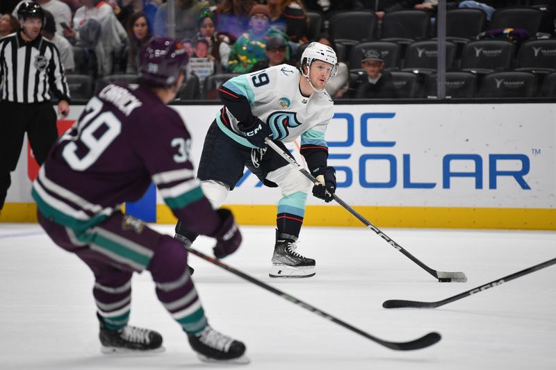 Dec 23, 2023; Anaheim, California, USA; Seattle Kraken left wing Jared McCann (19) moves in for a shot against the Anaheim Ducks during the first period at Honda Center. Mandatory Credit: Gary A. Vasquez-USA TODAY Sports