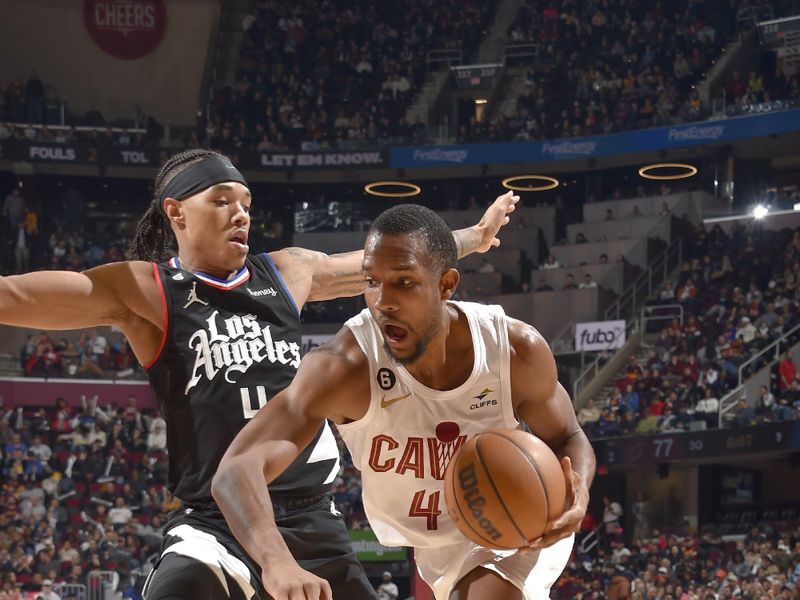 CLEVELAND, OH - JANUARY 29: Evan Mobley #4 of the Cleveland Cavaliers drives to the basket during the game against the LA Clippers on January 29, 2023 at Rocket Mortgage FieldHouse in Cleveland, Ohio. NOTE TO USER: User expressly acknowledges and agrees that, by downloading and/or using this Photograph, user is consenting to the terms and conditions of the Getty Images License Agreement. Mandatory Copyright Notice: Copyright 2023 NBAE (Photo by David Liam Kyle/NBAE via Getty Images)