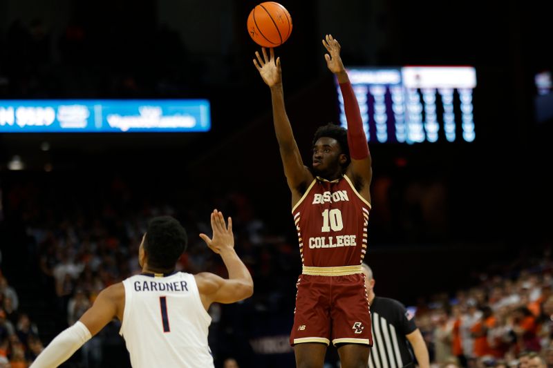 Jan 28, 2023; Charlottesville, Virginia, USA; Boston College Eagles guard Prince Aligbe (10) shoots the ball over Virginia Cavaliers forward Jayden Gardner (1) in the first half at John Paul Jones Arena. Mandatory Credit: Geoff Burke-USA TODAY Sports