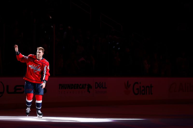 Nov 24, 2025; Washington, District of Columbia, USA; Washington Capitals defenseman Jakob Chychrun (6) waves to the crowd after being named number one star of the game against the Columbus Blue Jackets at Capital One Arena. Mandatory Credit: Geoff Burke-Imagn Images