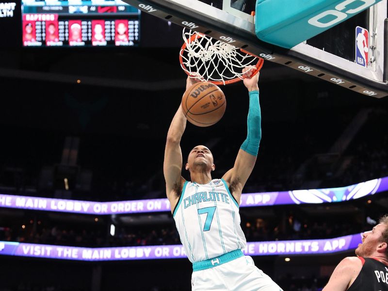 CHARLOTTE, NC - FEBRUARY 7:  Bryce McGowans #7 of the Charlotte Hornets dunks the ball during the game against the Toronto Raptors on February 7, 2024 at Spectrum Center in Charlotte, North Carolina. NOTE TO USER: User expressly acknowledges and agrees that, by downloading and or using this photograph, User is consenting to the terms and conditions of the Getty Images License Agreement.  Mandatory Copyright Notice:  Copyright 2024 NBAE (Photo by Brock Williams-Smith/NBAE via Getty Images)