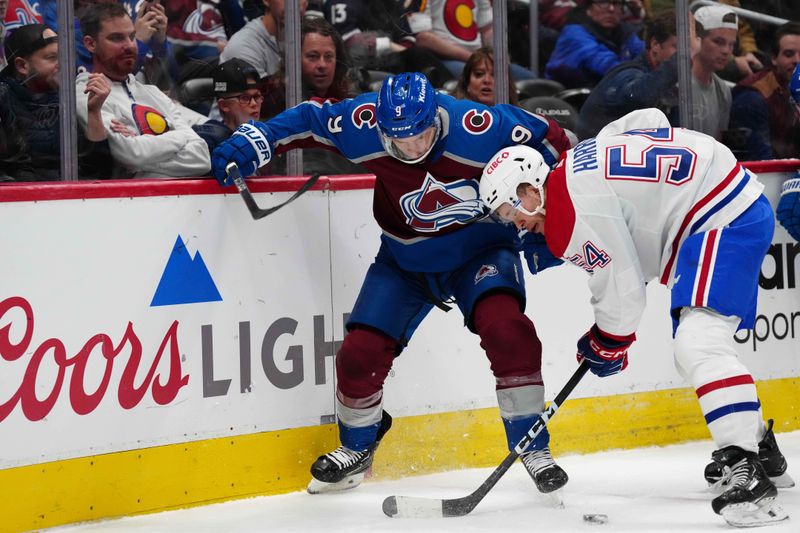 Mar 26, 2024; Denver, Colorado, USA; Montreal Canadiens defenseman Jordan Harris (54) and Colorado Avalanche left wing Zach Parise (9) battle for the puck in the first period at Ball Arena. Mandatory Credit: Ron Chenoy-USA TODAY Sports