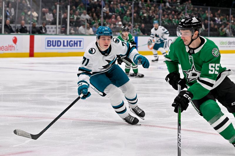 Nov 20, 2024; Dallas, Texas, USA; San Jose Sharks center Macklin Celebrini (71) chases Dallas Stars defenseman Thomas Harley (55) during the first period at the American Airlines Center. Mandatory Credit: Jerome Miron-Imagn Images