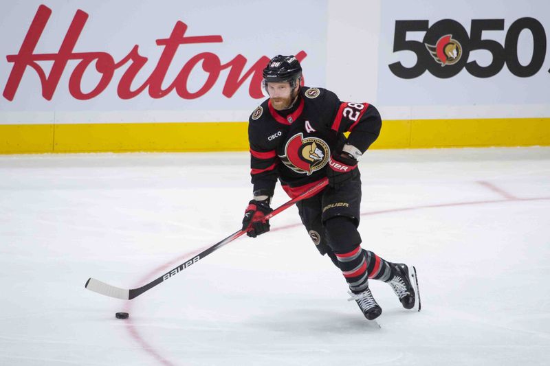 Oct 17, 2024; Ottawa, Ontario, CAN; Ottawa Senators right wing Claude Giroux (28) skates with the puck in the third period against the New Jersey Devils  at the Canadian Tire Centre. Mandatory Credit: Marc DesRosiers-Imagn Images