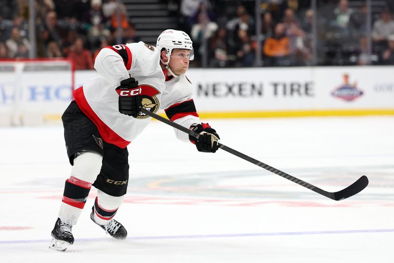 Mar 6, 2024; Anaheim, California, USA;  Ottawa Senators defenseman Jakob Chychrun (6) takes a slapshot during the third period against the Anaheim Ducks at Honda Center. Mandatory Credit: Kiyoshi Mio-USA TODAY Sports