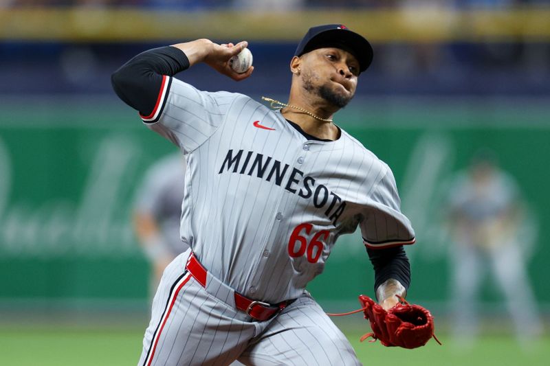 Sep 2, 2024; St. Petersburg, Florida, USA; Minnesota Twins pitcher Jorge Alcala (66) throws a pitch against the Tampa Bay Rays in the fifth inning at Tropicana Field. Mandatory Credit: Nathan Ray Seebeck-USA TODAY Sports