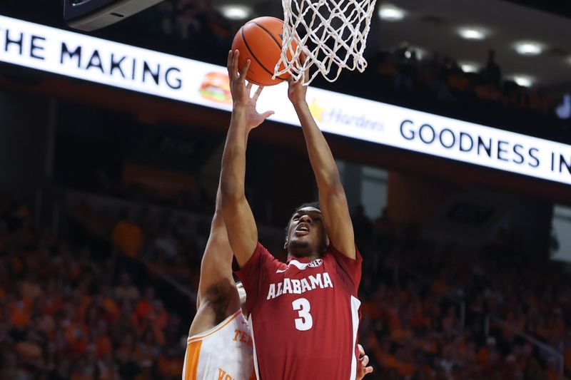 Jan 20, 2024; Knoxville, Tennessee, USA; Alabama Crimson Tide guard Rylan Griffen (3) goes to the basket against the Tennessee Volunteers during the first half at Thompson-Boling Arena at Food City Center. Mandatory Credit: Randy Sartin-USA TODAY Sports