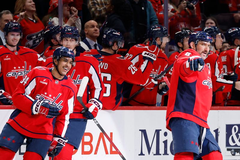 Jan 5, 2026; Washington, District of Columbia, USA; Washington Capitals left wing Alex Ovechkin (8) points to his son Sergei (not pictured) in the stands after scoring an empty net goal against the Anaheim Ducks during the third period at Capital One Arena. Mandatory Credit: Geoff Burke-Imagn Images