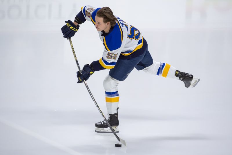 Mar 21, 2024; Ottawa, Ontario, CAN; St. Louis Blues center Zach Dean (52) warms up prior to playing in his first NHL game against the Ottawa Senators at the Canadian Tire Centre. Mandatory Credit: Marc DesRosiers-USA TODAY Sports