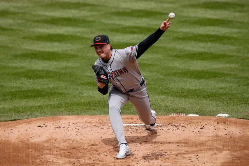 Apr 10, 2024; Denver, Colorado, USA; Arizona Diamondbacks starting pitcher Tommy Henry (47) pitches in the first inning against the Colorado Rockies at Coors Field. Mandatory Credit: Isaiah J. Downing-USA TODAY Sports