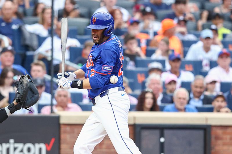 Jun 26, 2024; New York City, New York, USA;  New York Mets designated hitter J.D. Martinez (28) is hit by a pitch in the first inning against the New York Yankees at Citi Field. Mandatory Credit: Wendell Cruz-USA TODAY Sports