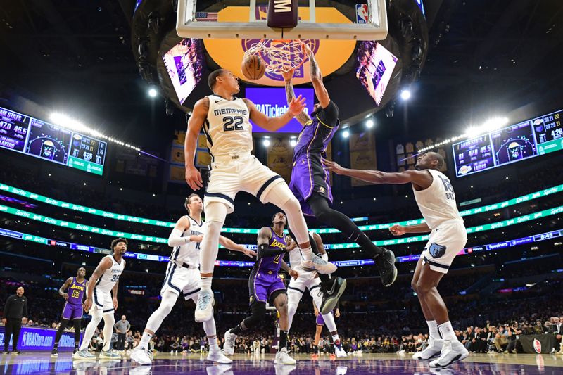 LOS ANGELES, CA - JANUARY 5: Anthony Davis #3 of the Los Angeles Lakers dunks the ball during the game against the Memphis Grizzlies on January 5, 2024 at Crypto.Com Arena in Los Angeles, California. NOTE TO USER: User expressly acknowledges and agrees that, by downloading and/or using this Photograph, user is consenting to the terms and conditions of the Getty Images License Agreement. Mandatory Copyright Notice: Copyright 2024 NBAE (Photo by Adam Pantozzi/NBAE via Getty Images)