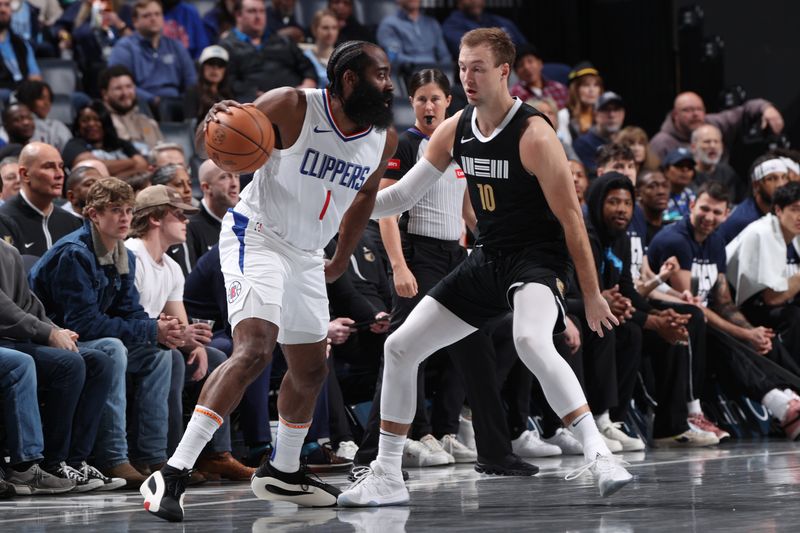 MEMPHIS, TN - FEBRUARY 23: James Harden #1 of the LA Clippers dribbles the ball during the game against Luke Kennard #10 of the Memphis Grizzlies on February 23, 2024 at FedExForum in Memphis, Tennessee. NOTE TO USER: User expressly acknowledges and agrees that, by downloading and or using this photograph, User is consenting to the terms and conditions of the Getty Images License Agreement. Mandatory Copyright Notice: Copyright 2024 NBAE (Photo by Joe Murphy/NBAE via Getty Images)