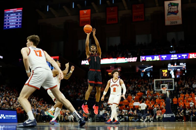 Jan 10, 2026; Charlottesville, Virginia, USA; Stanford Cardinal guard Ebuka Okorie (1) shoots the ball as Virginia Cavaliers guard Martin Carrere (7) defends in the first half at John Paul Jones Arena. Mandatory Credit: Geoff Burke-Imagn Images