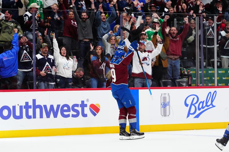 Oct 18, 2024; Denver, Colorado, USA; Colorado Avalanche center Nathan MacKinnon (29) celebrates his overtime goal against the Anaheim Ducks at Ball Arena. Mandatory Credit: Ron Chenoy-Imagn Images