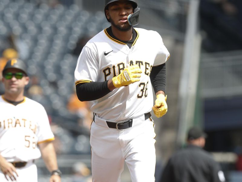 Apr 9, 2024; Pittsburgh, Pennsylvania, USA;  Pittsburgh Pirates right fielder Edward Olivares (38) circles the bases after hitting a solo home run against the Detroit Tigers  during the sixth inning at PNC Park. Mandatory Credit: Charles LeClaire-USA TODAY Sports