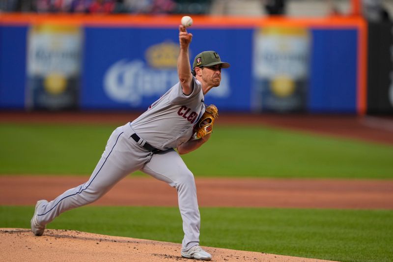 May 21, 2023; New York City, New York, USA; Cleveland Guardians pitcher Shane Bieber (57) delivers a pitch against the New York Mets during the first inning at Citi Field. Mandatory Credit: Gregory Fisher-USA TODAY Sports