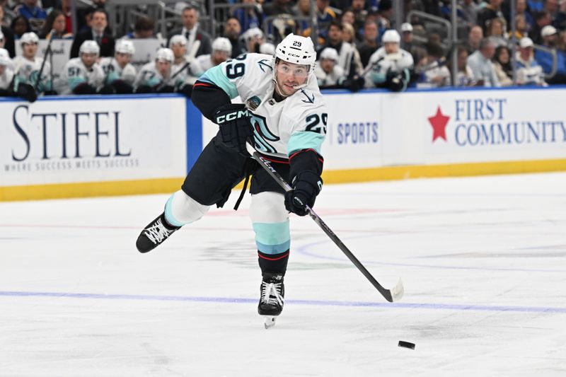 Nov 8, 2025; St. Louis, Missouri, USA; Seattle Kraken defenseman Vince Dunn (29) takes a shot against the St. Louis Blues in the first period at Enterprise Center. Mandatory Credit: Joe Puetz-Imagn Images