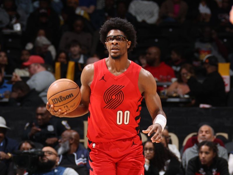 WASHINGTON, DC -? APRIL 5: Scoot Henderson #00 of the Portland Trail Blazers dribbles the ball during the game against the Washington Wizards on April 5, 2024 at Capital One Arena in Washington, DC. NOTE TO USER: User expressly acknowledges and agrees that, by downloading and or using this Photograph, user is consenting to the terms and conditions of the Getty Images License Agreement. Mandatory Copyright Notice: Copyright 2024 NBAE (Photo by Stephen Gosling/NBAE via Getty Images)