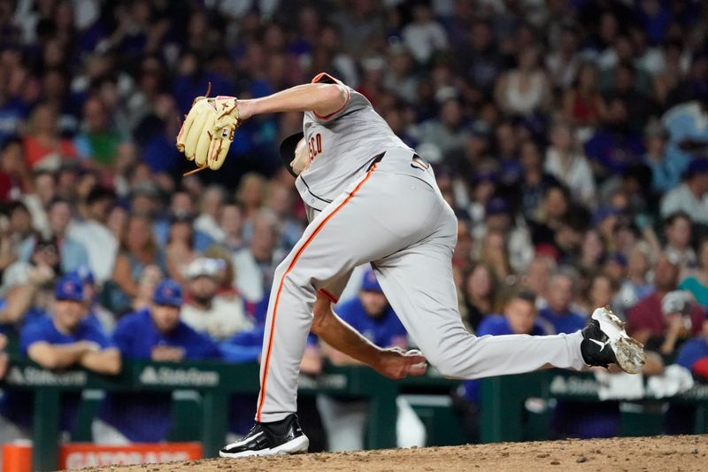 Jun 18, 2024; Chicago, Illinois, USA; San Francisco Giants pitcher Tyler Rogers (71) throws the ball against the Chicago Cubs during the eighth inning at Wrigley Field. Mandatory Credit: David Banks-USA TODAY Sports