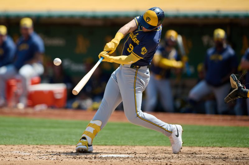 Aug 24, 2024; Oakland, California, USA; Milwaukee Brewers infielder Jake Bauers (9) hits a two run home run against the Oakland Athletics during the fifth inning at Oakland-Alameda County Coliseum. Mandatory Credit: Robert Edwards-USA TODAY Sports