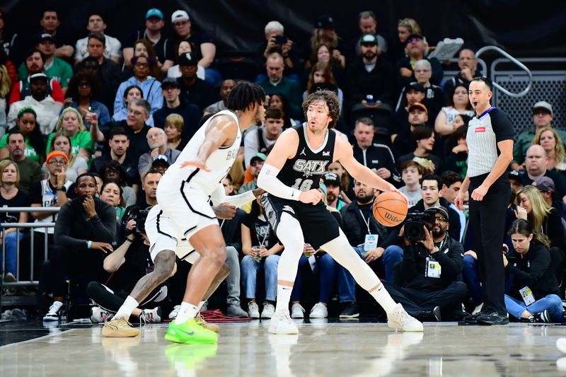 AUSTIN, TX - MARCH 17: Cedi Osman #16 of the San Antonio Spurs handles the ball during the game against the Brooklyn Nets on March 17, 2024 at the Moody Center in Austin, Texas. NOTE TO USER: User expressly acknowledges and agrees that, by downloading and or using this photograph, user is consenting to the terms and conditions of the Getty Images License Agreement. Mandatory Copyright Notice: Copyright 2024 NBAE (Photos by Michael Gonzales/NBAE via Getty Images)