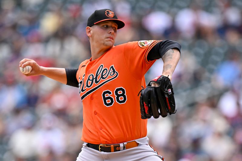 Jul 8, 2023; Minneapolis, Minnesota, USA;  Baltimore Orioles pitcher Tyler Wells (68) delivers a pitch against the Minnesota Twins during the first inning at Target Field. Mandatory Credit: Nick Wosika-USA TODAY Sports