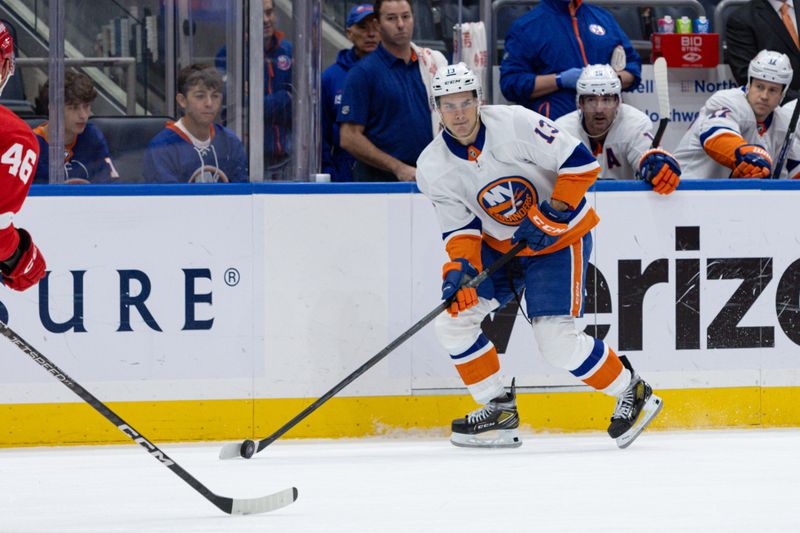 Oct 30, 2023; Elmont, New York, USA; New York Islanders center Mathew Barzal (13) looks to make a pass against the Detroit Red Wings during the second period at UBS Arena. Mandatory Credit: Thomas Salus-USA TODAY Sports