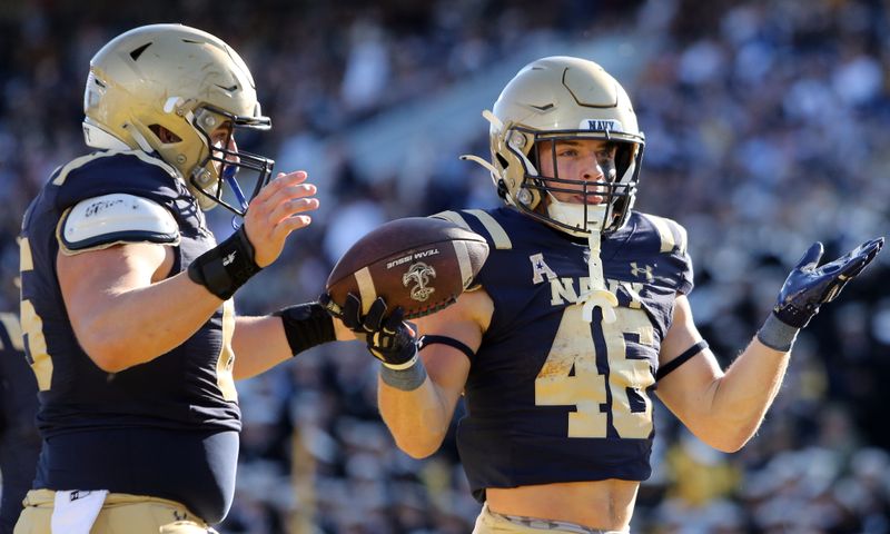 Oct 19, 2024; Annapolis, Maryland, USA; Navy Midshipmen fullback Alex Tecza (46) celebrates after scoring a touchdown against the Charlotte 49ers during the first half at Navy-Marine Corps Memorial Stadium. Mandatory Credit: Daniel Kucin Jr.-Imagn Images