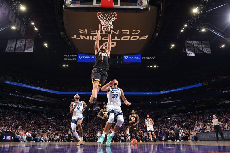 PHOENIX, AZ - APRIL 4: Devin Booker #1 of the Phoenix Suns dunks the ball during the game against the Minnesota Timberwolves during Round 1 Game 4 of the 2024 NBA Playoffs on April 4, 2023 at Footprint Center in Phoenix, Arizona. NOTE TO USER: User expressly acknowledges and agrees that, by downloading and or using this photograph, user is consenting to the terms and conditions of the Getty Images License Agreement. Mandatory Copyright Notice: Copyright 2024 NBAE (Photo by Barry Gossage/NBAE via Getty Images)