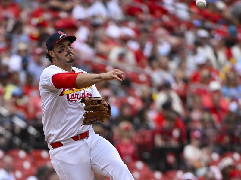May 5, 2024; St. Louis, Missouri, USA;  St. Louis Cardinals third baseman Nolan Arenado (28) throws on the run against the Chicago White Sox during the fifth inning at Busch Stadium. Mandatory Credit: Jeff Curry-USA TODAY Sports
