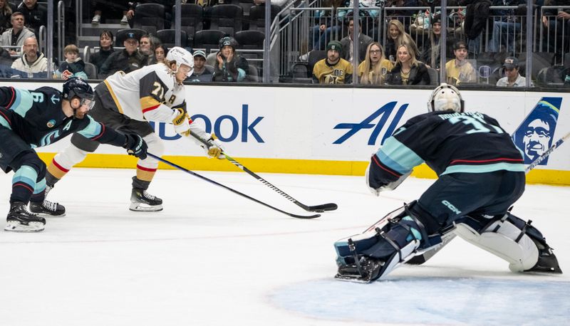 Mar 12, 2024; Seattle, Washington, USA; Vegas Golden Knights forward William Karlsson (71) takes a shot against Seattle Kraken defenseman Adam Larsson and goalie Philipp Grubauer (31) during the third period at Climate Pledge Arena. Mandatory Credit: Stephen Brashear-USA TODAY Sports