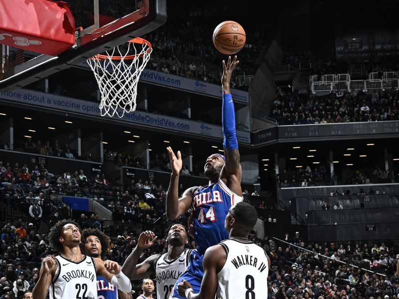 BROOKLYN, NY - MARCH 5: Paul Reed #44 of the Philadelphia 76ers drives to the basket during the game against the Brooklyn Nets on March 5, 2024 at Barclays Center in Brooklyn, New York. NOTE TO USER: User expressly acknowledges and agrees that, by downloading and or using this Photograph, user is consenting to the terms and conditions of the Getty Images License Agreement. Mandatory Copyright Notice: Copyright 2024 NBAE (Photo by David Dow/NBAE via Getty Images)