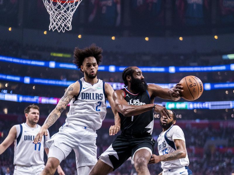 LOS ANGELES, CA - APRIL 23: James Harden #1 of the LA Clippers passes the ball during the game against the Dallas Mavericks during Round 1 Game 2 of the 2024 NBA Playoffs on April 23, 2024 at Crypto.Com Arena in Los Angeles, California. NOTE TO USER: User expressly acknowledges and agrees that, by downloading and/or using this Photograph, user is consenting to the terms and conditions of the Getty Images License Agreement. Mandatory Copyright Notice: Copyright 2024 NBAE (Photo by Tyler Ross/NBAE via Getty Images)