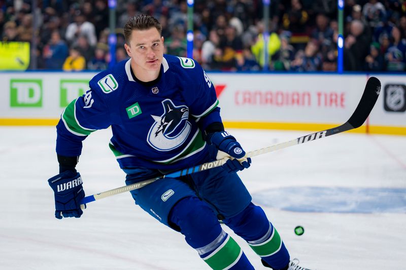 Mar 13, 2024; Vancouver, British Columbia, CAN; Vancouver Canucks defenseman Nikita Zadorov (91) skates during warm up prior to a game against the Colorado Avalanche at Rogers Arena. Mandatory Credit: Bob Frid-USA TODAY Sports