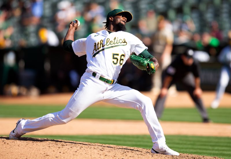 Sep 16, 2023; Oakland, California, USA; Oakland Athletics pitcher Dany Jim  nez (56) delivers a pitch against the San Diego Padres during the ninth inning at Oakland-Alameda County Coliseum. Mandatory Credit: D. Ross Cameron-USA TODAY Sports