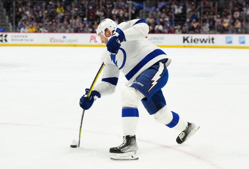 Feb 14, 2023; Denver, Colorado, USA; Tampa Bay Lightning center Steven Stamkos (91) takes a shot on goal in first period against the Colorado Avalanche at Ball Arena. Mandatory Credit: Ron Chenoy-USA TODAY Sports