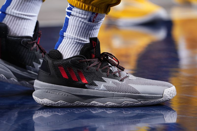 DALLAS, TX - MARCH 13: The sneakers worn by Trayce Jackson-Davis #32 of the Golden State Warriors before the game against the Dallas Mavericks on March 13, 2024 at the American Airlines Center in Dallas, Texas. NOTE TO USER: User expressly acknowledges and agrees that, by downloading and or using this photograph, User is consenting to the terms and conditions of the Getty Images License Agreement. Mandatory Copyright Notice: Copyright 2024 NBAE (Photo by Glenn James/NBAE via Getty Images)