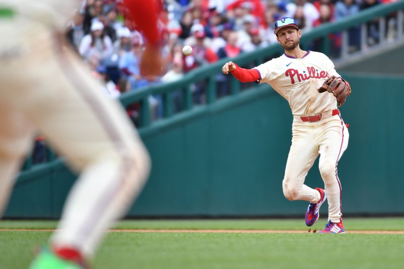 Apr 21, 2024; Philadelphia, Pennsylvania, USA; Philadelphia Phillies shortstop Trea Turner (7) throws to first base against the Chicago White Sox during the sixth inning at Citizens Bank Park. Mandatory Credit: Eric Hartline-USA TODAY Sports