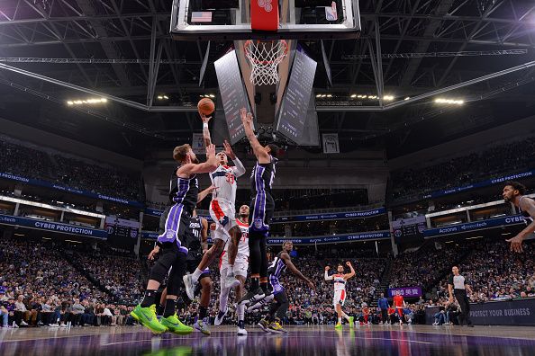 SACRAMENTO, CA - DECEMBER 18: Kyle Kuzma #33 of the Washington Wizards drives to the basket during the game against the Sacramento Kings on December 18, 2023 at Golden 1 Center in Sacramento, California. NOTE TO USER: User expressly acknowledges and agrees that, by downloading and or using this Photograph, user is consenting to the terms and conditions of the Getty Images License Agreement. Mandatory Copyright Notice: Copyright 2023 NBAE (Photo by Rocky Widner/NBAE via Getty Images)