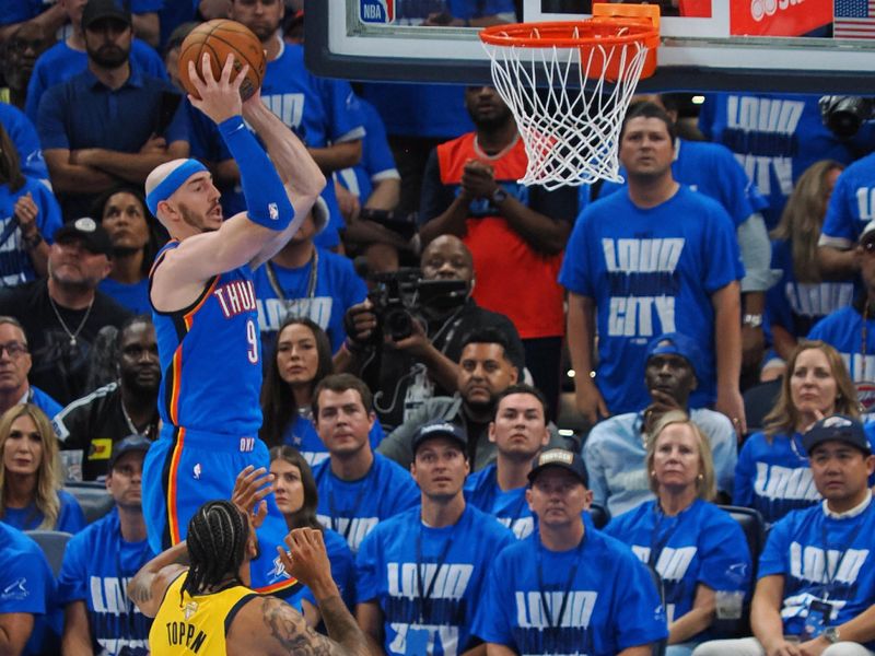 OKLAHOMA CITY, OK - JUNE 8: Alex Caruso #9 of the Oklahoma City Thunder drives to the basket during the game against the Indiana Pacers during Game Two of the 2025 NBA Finals on June 8, 2025 at Paycom Center in Oklahoma City, Oklahoma. NOTE TO USER: User expressly acknowledges and agrees that, by downloading and or using this photograph, User is consenting to the terms and conditions of the Getty Images License Agreement. Mandatory Copyright Notice: Copyright 2025 NBAE (Photo by Ron Hoskins/NBAE via Getty Images)