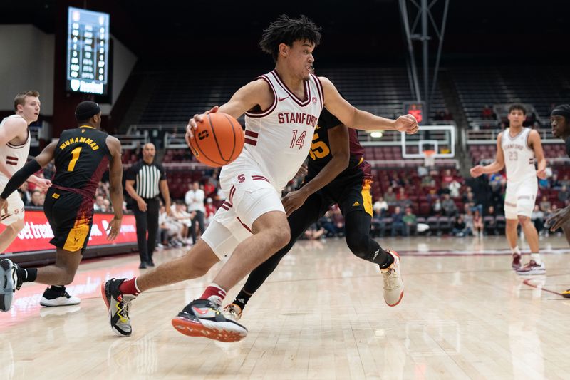 Feb 9, 2023; Stanford, California, USA;  Stanford Cardinal forward Spencer Jones (14) drives the ball during the first half against Arizona State Sun Devils guard Devan Cambridge (35) at Maples Pavilion. Mandatory Credit: Stan Szeto-USA TODAY Sports