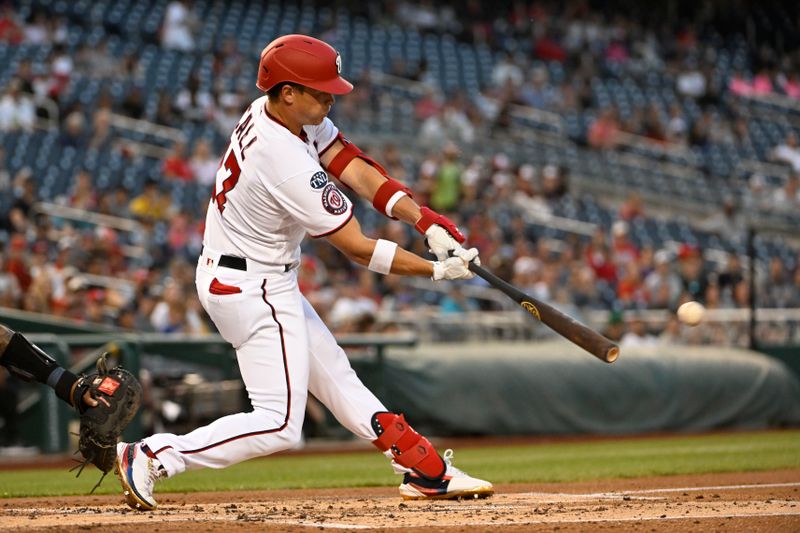 Apr 4, 2023; Washington, District of Columbia, USA; Washington Nationals left fielder Alex Call (17) hits a two RBI single against the Tampa Bay Rays during the first inning at Nationals Park. Mandatory Credit: Brad Mills-USA TODAY Sports