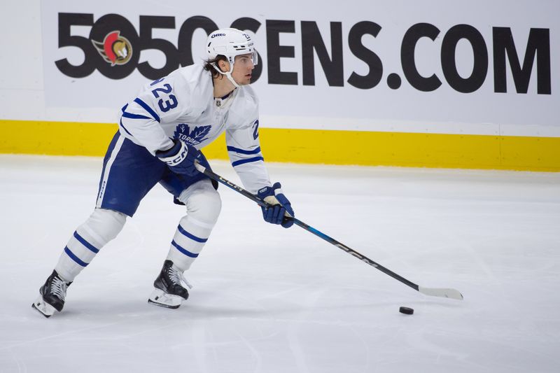 Sep 24, 2024; Ottawa, Ontario, CAN; Toronto Maple Leafs left swing Matthew Knies (23) skates with the puck in the third period against the Ottawa Senators at the Canadian Tire Centre. Mandatory Credit: Marc DesRosiers-Imagn Images