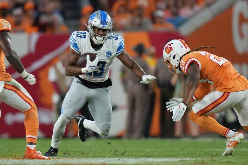 Detroit Lions running back Devine Ozigbo (33) runs after a catch during an NFL football game against the Tampa Bay Buccaneers, Sunday, Oct. 15 2023, in Tampa, Fla. (AP Photo/Peter Joneleit)