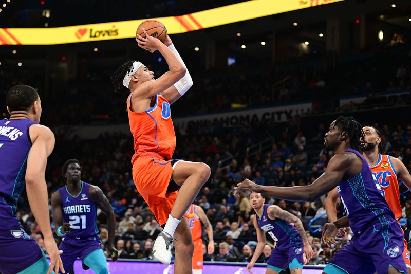 OKLAHOMA CITY, OKLAHOMA - FEBRUARY 2: Ousmane Dieng #13 of the Oklahoma City Thunder goes up for a shot during the second half against the Charlotte Hornets at Paycom Center on February 2, 2024 in Oklahoma City, Oklahoma. NOTE TO USER: User expressly acknowledges and agrees that, by downloading and or using this Photograph, user is consenting to the terms and conditions of the Getty Images License Agreement. (Photo by Joshua Gateley/Getty Images)