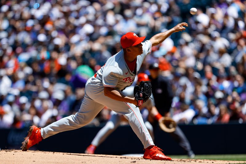 May 26, 2024; Denver, Colorado, USA; Philadelphia Phillies starting pitcher Ranger Suarez (55) pitches in the first inning against the Colorado Rockies at Coors Field. Mandatory Credit: Isaiah J. Downing-USA TODAY Sports