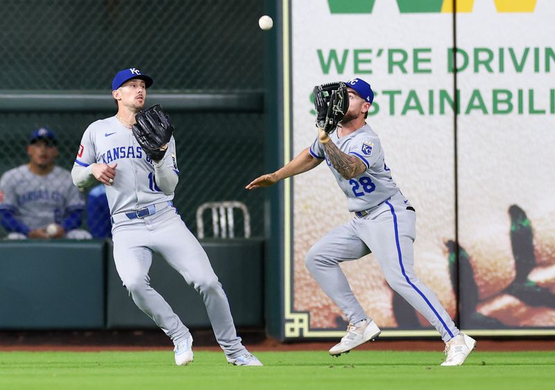 May 12, 2025; Houston, Texas, USA; Kansas City Royals center fielder Kyle Isbel (28) catches Houston Astros right fielder Cam Smith (11)(not pictured) fly ball for an out  in the eighth inning at Daikin Park. Mandatory Credit: Thomas Shea-Imagn Images